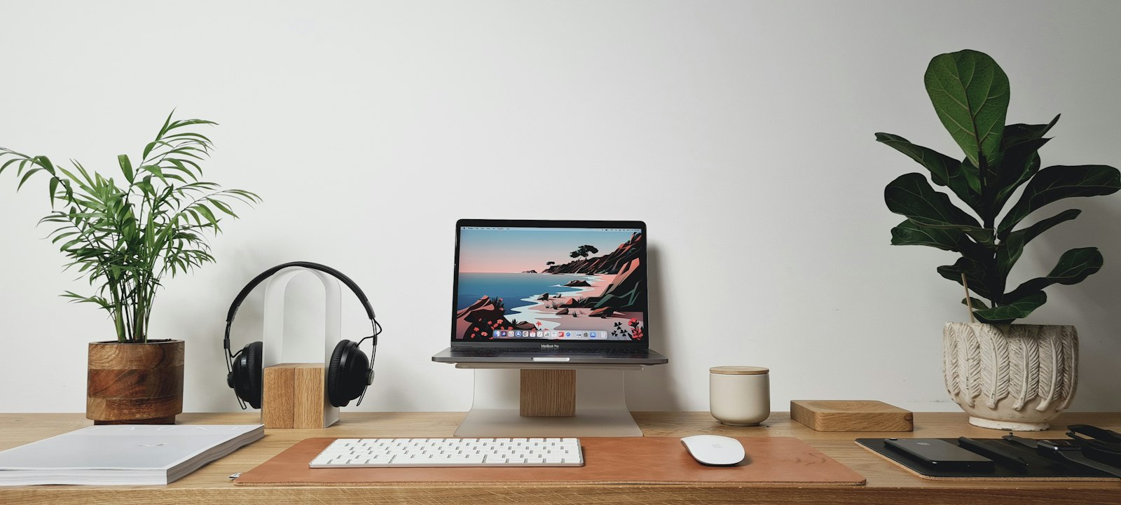 Silver imac on brown wooden desk