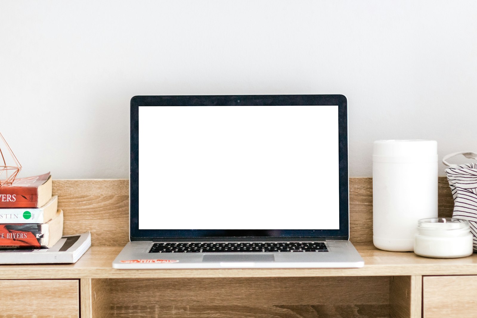 Turned-on MacBook on desk