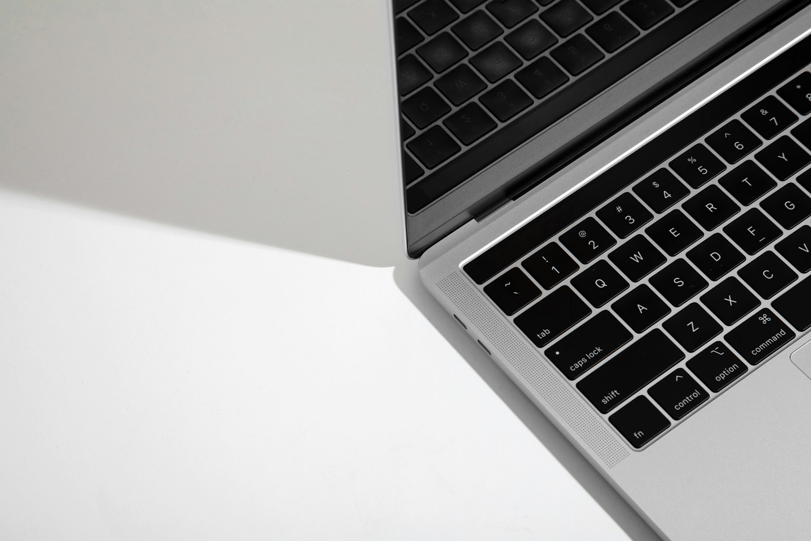 Black and silver laptop computer
