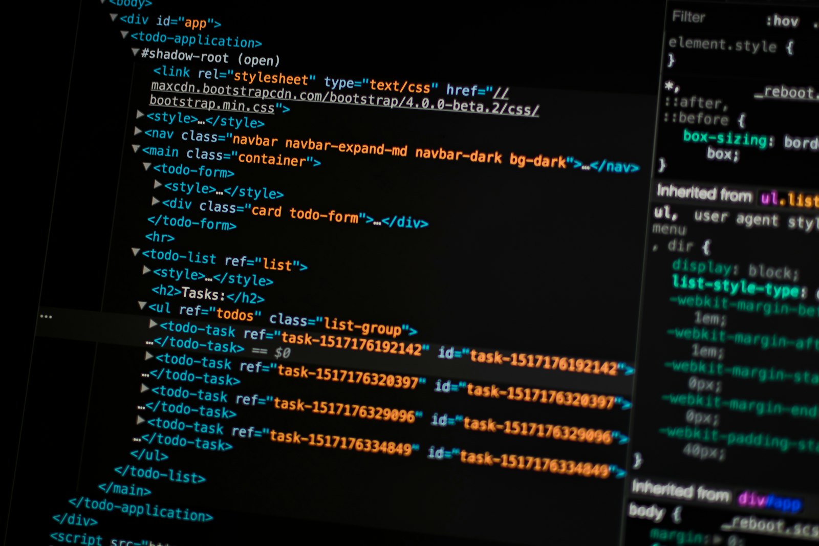 Turned on monitor displaying programming language