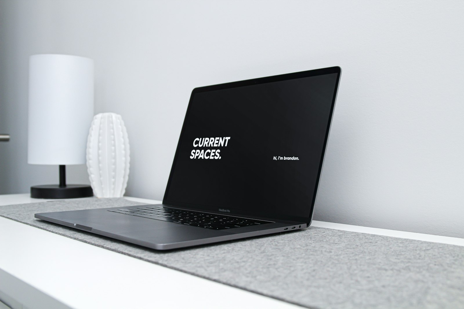Black lenovo laptop computer on white table